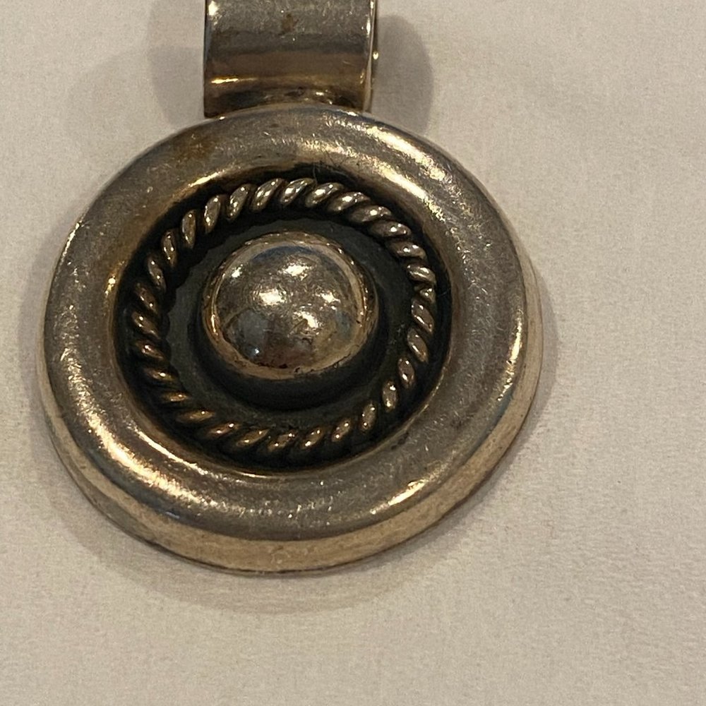 VINTAGE sterling silver pendant.